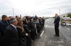 President Ilham Aliyev opens new settlement for people from flood-hit areas (PHOTO)