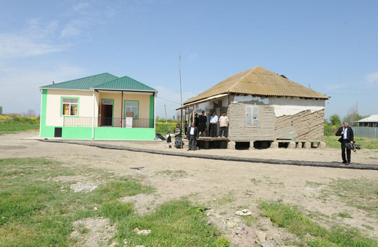 Azerbaijani president views new houses built for flood-affected villagers (PHOTOS)