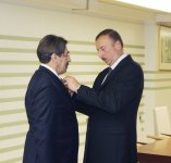 Президент Азербайджана вручил группе общественных деятелей орден "Достлуг" и медаль "Терегги" (ФОТО)