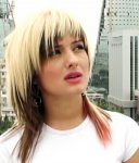 Скандальная исполнительница рэпа Мина бьет рекорд (видео-фотосессия)