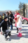 "Каждой женщине - по цветку" – праздничная акция в Ичери Шехер (фото)