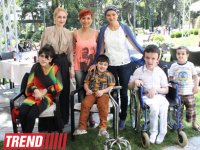 Азербайджанские деятели культуры и искусства провели акцию "Одень ребенка к празднику" (фото)