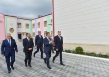 Президент Азербайджана ознакомился с новым кварталом, построенным в Барде для вынужденных переселенцев (ФОТО)