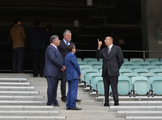 Azerbaijani president, his spouse review progress of construction at Baku Olympic Stadium