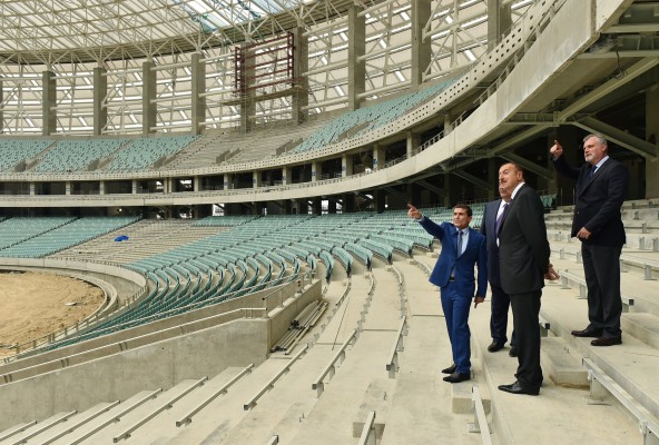 Azerbaijani president, his spouse review progress of construction at Baku Olympic Stadium