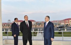 Президент Ильхам Алиев принял участие в открытии нового поселка, построенного в Гяндже для вынужденных переселенцев (ФОТО)