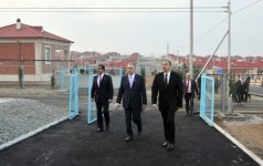 Президент Ильхам Алиев принял участие в открытии нового поселка, построенного в Гяндже для вынужденных переселенцев (ФОТО)