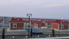 Президент Ильхам Алиев принял участие в открытии нового поселка, построенного в Гяндже для вынужденных переселенцев (ФОТО)