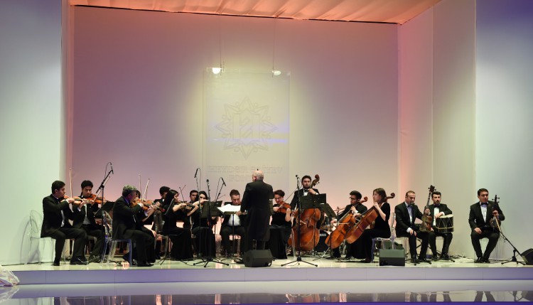 President Ilham Aliyev and his spouse attended a solemn ceremony to mark 92nd birthday anniversary of national leader Heydar Aliyev