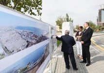 Ilham Aliyev, his spouse attend opening of new highway in Baku