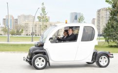 Ilham Aliyev, his spouse review Baku White City boulevard