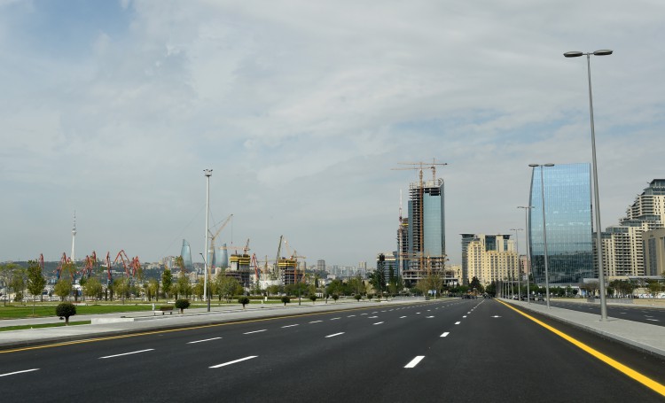 Ilham Aliyev, his spouse attend opening of new highway in Baku