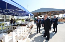 Azerbaijani president observes two exhibitions in Baku (PHOTO)