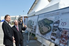 Azerbaijani president observes two exhibitions in Baku (PHOTO)