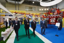 Azerbaijani president observes two exhibitions in Baku (PHOTO)