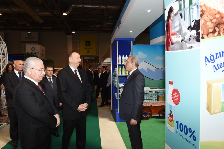 Azerbaijani president observes two exhibitions in Baku (PHOTO)