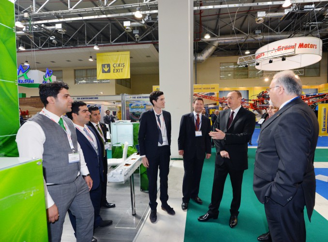 Azerbaijani president observes two exhibitions in Baku (PHOTO)