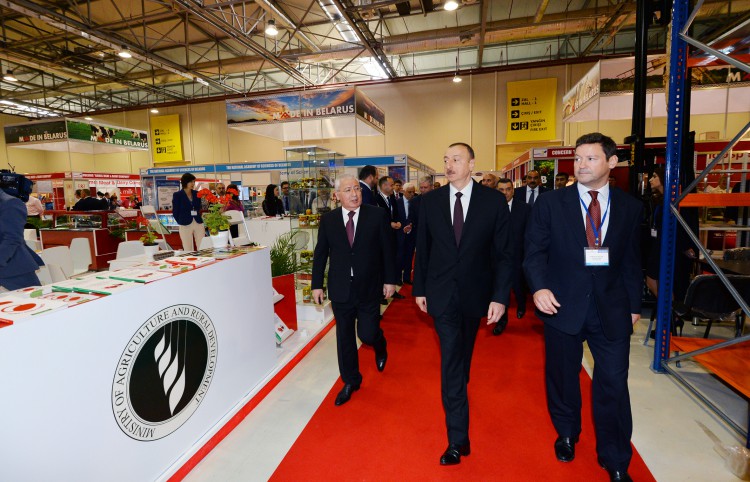 Azerbaijani president observes two exhibitions in Baku (PHOTO)