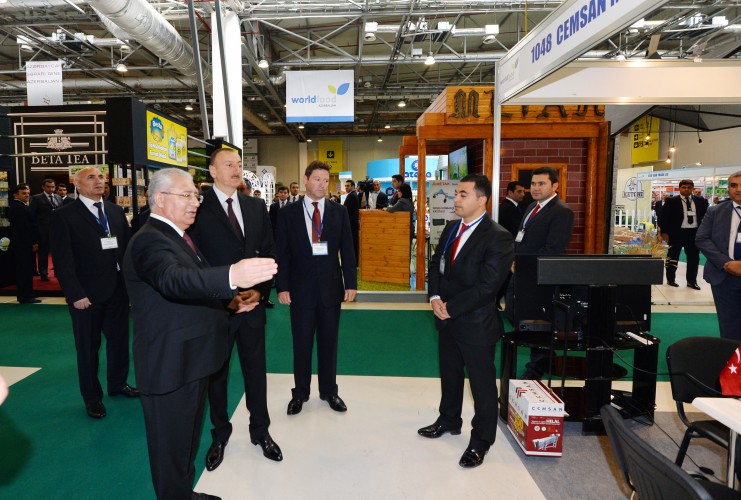 Azerbaijani president observes two exhibitions in Baku (PHOTO)