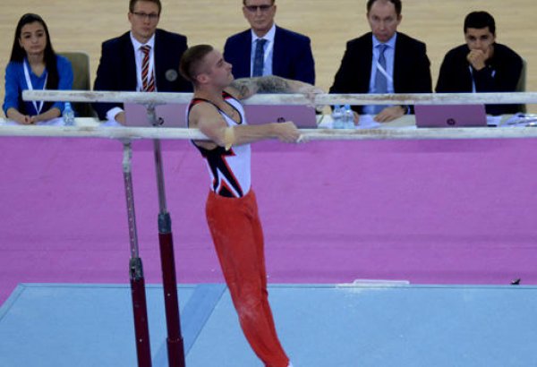Azerbaijani gymnast Oleg Stepko grabs gold in bars event (PHOTO)