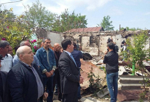 Diplomats visit Azerbaijan’s Aghdam, view houses shelled by Armenians