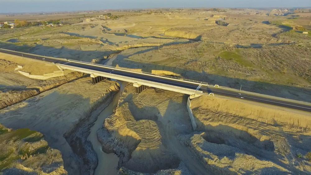 President Aliyev attends opening of new bridge over Tartar River (PHOTO)