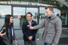 Делегация из Японии прибыла в Баку для участия в Кубке мира по прыжкам на батуте и тамблингу (ФОТОРЕПОРТАЖ)