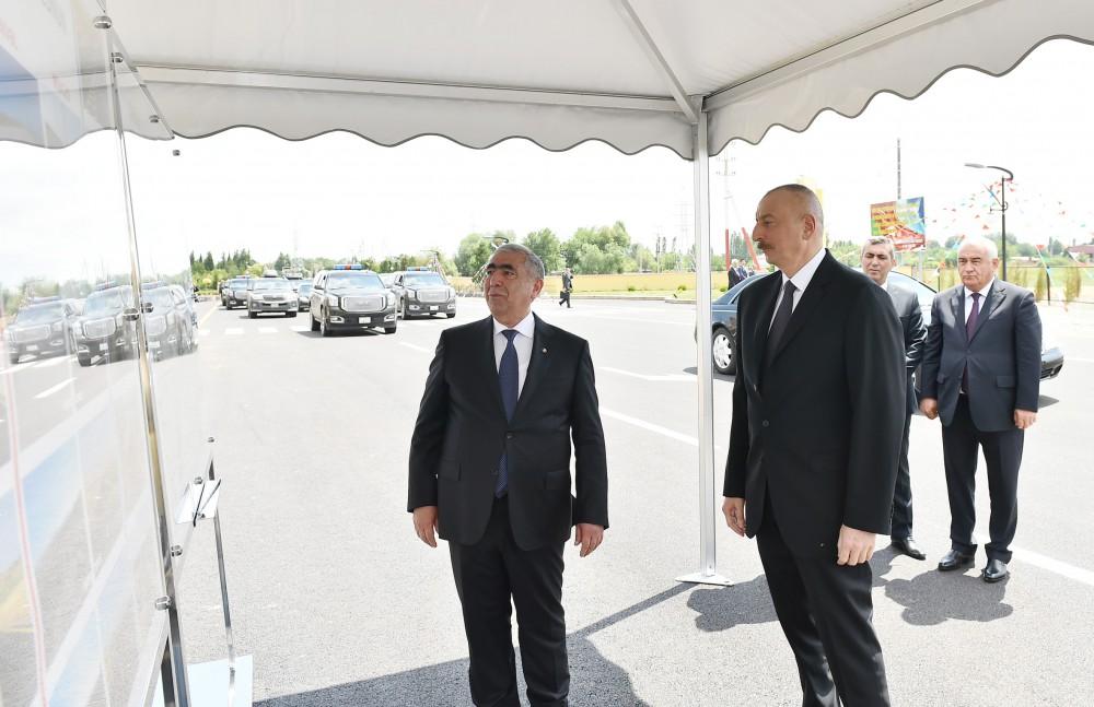 Президент Ильхам Алиев принял участие в открытии сельской дороги в Джоджуг Мерджанлы (ФОТО)