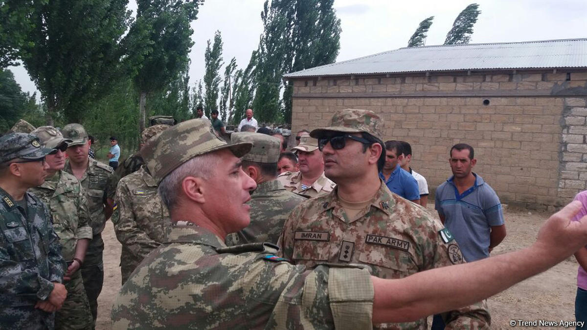 Foreign media reps view Armenia-shelled Azerbaijani village (PHOTO)