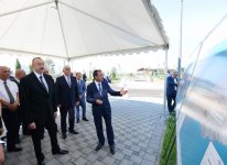 Президент Ильхам Алиев принял участие в открытии проекта обеспечения поселка Пираллахи питьевой водой (ФОТО)