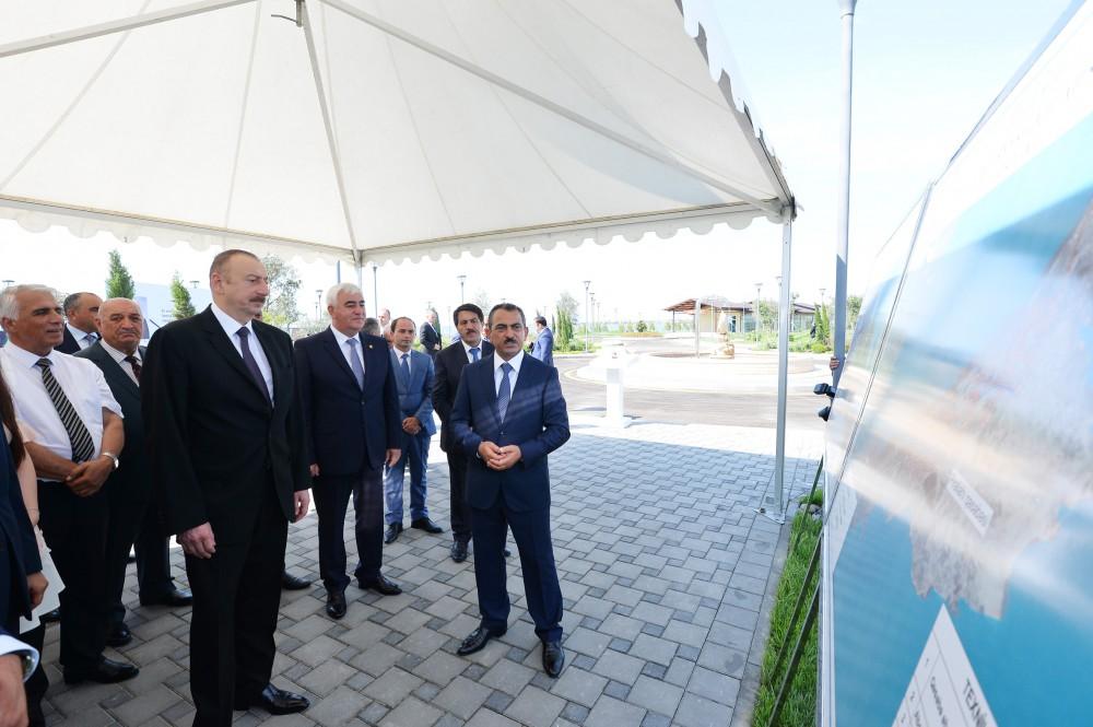 Президент Ильхам Алиев принял участие в открытии проекта обеспечения поселка Пираллахи питьевой водой (ФОТО)