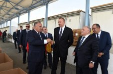 Президент Ильхам Алиев ознакомился с условиями, созданными в пункте приема табака в Гахе (ФОТО)