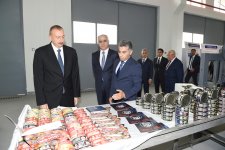 Azerbaijani president attends opening of Neftchala Industrial District (PHOTO)