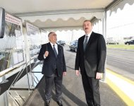 Президент Ильхам Алиев принял участие в открытии разноуровневой дорожной развязки и перехода к проспекту Гейдара Алиева в Баку (ФОТО)
