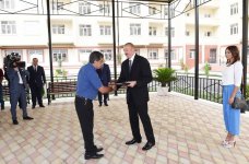 Президент Азербайджана и его супруга приняли участие в церемонии передачи квартир и автомобилей инвалидам войн и семьям шехидов (ФОТО)
