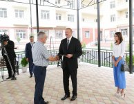 Президент Азербайджана и его супруга приняли участие в церемонии передачи квартир и автомобилей инвалидам войн и семьям шехидов (ФОТО)