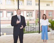 Президент Азербайджана и его супруга приняли участие в церемонии передачи квартир и автомобилей инвалидам войн и семьям шехидов (ФОТО)