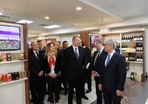 President Ilham Aliyev observes Azerbaijan’s trading house in Minsk (PHOTO)