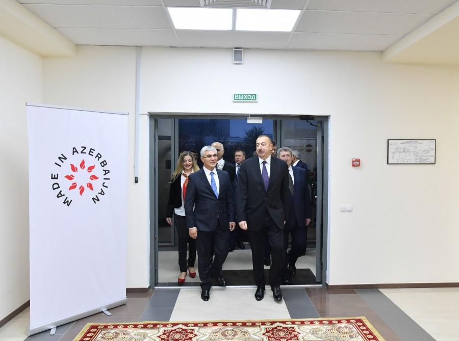 President Ilham Aliyev observes Azerbaijan’s trading house in Minsk (PHOTO)