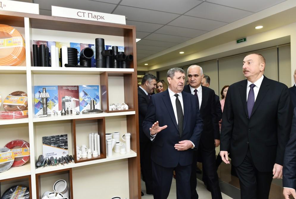 President Ilham Aliyev observes Azerbaijan’s trading house in Minsk (PHOTO)
