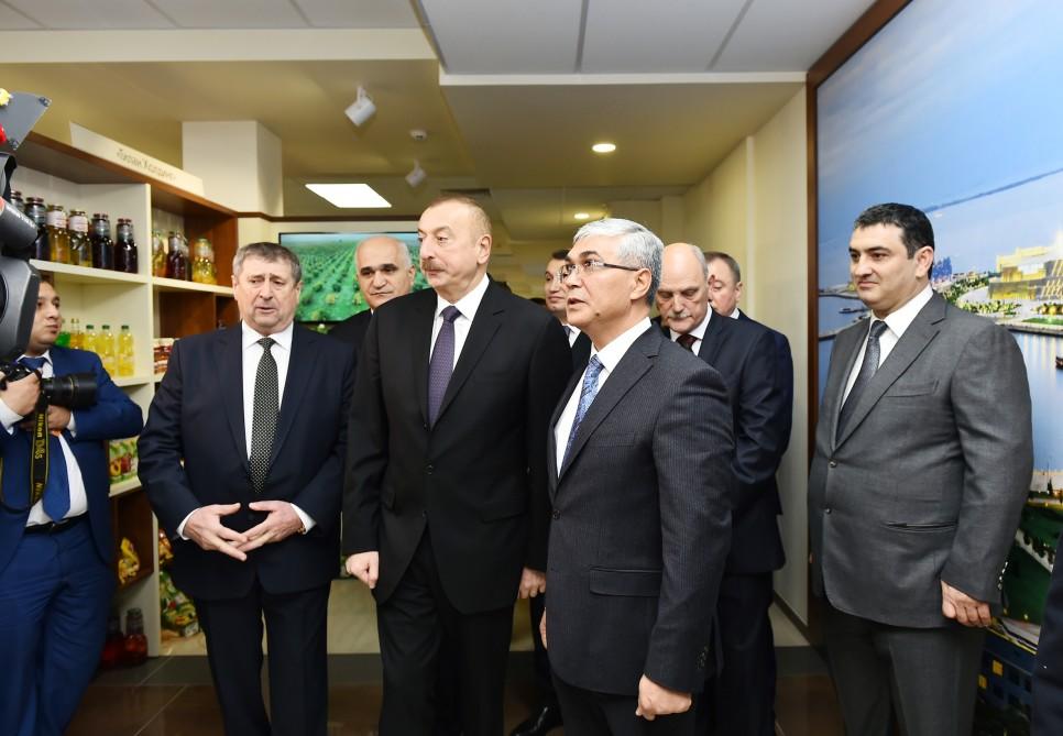 President Ilham Aliyev observes Azerbaijan’s trading house in Minsk (PHOTO)