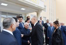 Президент Ильхам Алиев и Первая леди Мехрибан Алиева приняли участие в открытии жилого комплекса для семей вынужденных переселенцев (ФОТО) (версия 2)