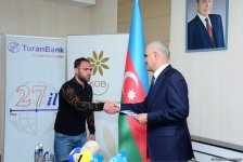 57 businessmen of burnt down shopping center in Baku receive financial assistance (PHOTO)