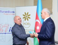 57 businessmen of burnt down shopping center in Baku receive financial assistance (PHOTO)