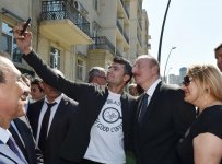 Президент Ильхам Алиев и Первая леди Мехрибан Алиева приняли участие в открытии Центрального парка и сквера в Баку (ФОТО)