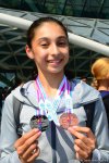 Victorious Azerbaijani gymnast returns home from FIG Championships in Moscow (PHOTO)