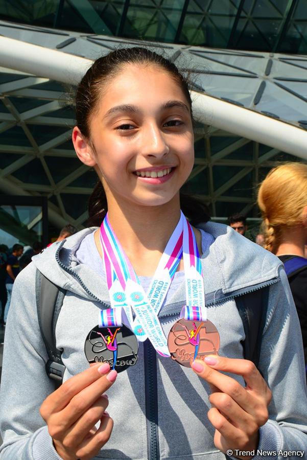 Victorious Azerbaijani gymnast returns home from FIG Championships in Moscow (PHOTO)