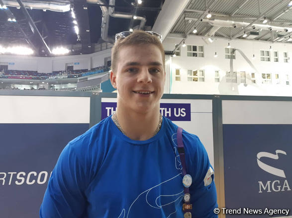 Athlete from Belarus talks on Azerbaijani National Gymnastics Arena during EYOF Baku 2019