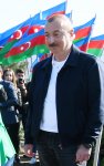 Президент Ильхам Алиев и Первая леди Мехрибан Алиева приняли участие в акции по посадке деревьев в Хатаинском районе Баку (ФОТО) (версия 2)