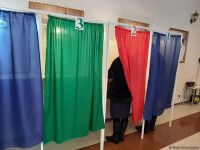 Azerbaijani people voting in parliamentary elections (PHOTO)